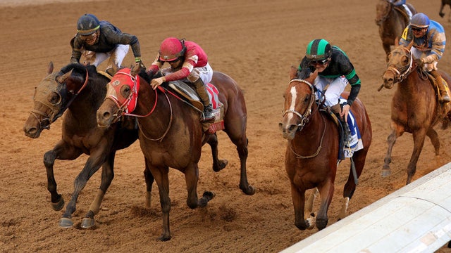 The field rounds turn one during the 149th running of the Kentucky Derby at Churchill Downs on May 6, 2023, in Louisville, Kentucky. 