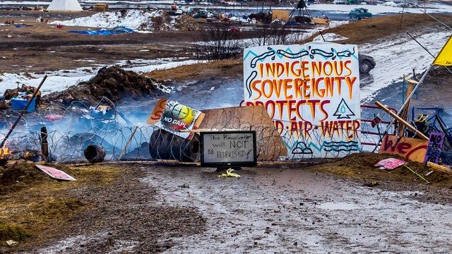 Defiant Dakota Access Pipeline water protectors faced-off 